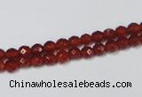 CAA117 15.5 inches 4mm faceted round red agate gemstone beads