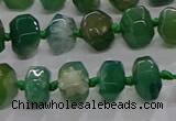 CAA1207 15.5 inches 8*12mm - 10*14mm faceted nuggets sakura agate beads