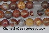 CAA1221 15.5 inches 6mm round gold mountain agate beads