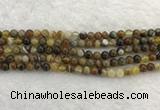 CAA1860 15.5 inches 4mm round banded agate gemstone beads