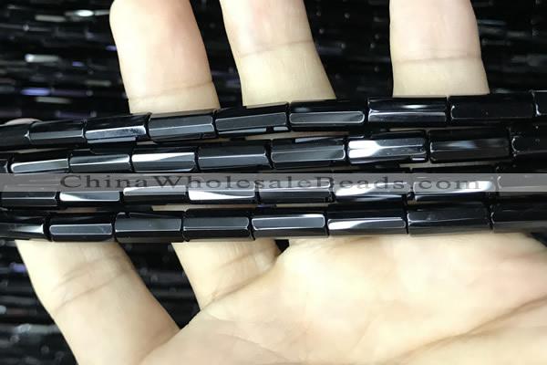 CAA2475 15.5 inches 6*12mm faceted tube black agate beads