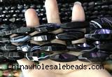 CAA2656 15.5 inches 10*30mm faceted rice banded black agate beads
