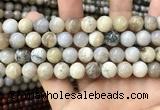 CAA3584 15.5 inches 10mm round ocean fossil agate beads wholesale