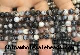 CAA3591 15.5 inches 4mm round black zebra agate beads wholesale