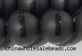 CAA3653 15.5 inches 12mm round matte & carved black agate beads