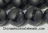 CAA3657 15.5 inches 10mm round matte & carved black agate beads