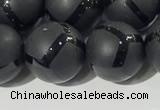 CAA3658 15.5 inches 12mm round matte & carved black agate beads