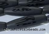 CAA3681 15.5 inches 8*30mm rice matte & carved black agate beads