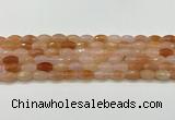 CAA5464 15.5 inches 8*12mm faceted rice agate beads
