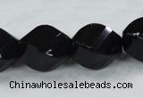 CAB338 15.5 inches 18*24mm faceted & twisted rice black agate beads
