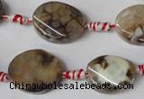 CAG1576 15.5 inches 15*20mm twisted oval fire crackle agate beads
