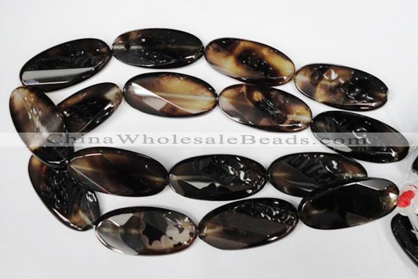 CAG3091 15.5 inches 25*50mm faceted oval black line agate beads
