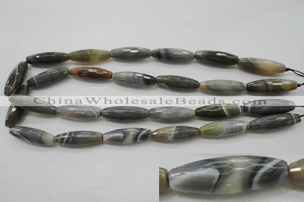 CAG3958 15.5 inches 10*30mm faceted rice grey botswana agate beads