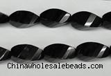 CAG4009 15.5 inches 8*16mm faceted & twisted rice black agate beads