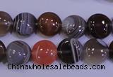 CAG4442 15.5 inches 12mm flat round botswana agate beads wholesale