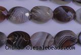 CAG4463 15.5 inches 12*16mm faceted oval botswana agate beads