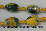 CAG5774 15 inches 10*14mm faceted rice fire crackle agate beads