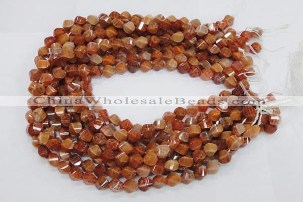 CAG582 15.5 inches 10*14mm faceted & twisted rice natural fire agate beads