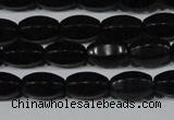 CAG6029 15.5 inches 6*10mm faceted rice matte black agate beads