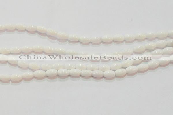 CAG7201 15.5 inches 6*9mm rice white agate gemstone beads