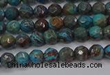 CAG9480 15.5 inches 4mm faceted round blue crazy lace agate beads