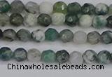 CAG9823 15.5 inches 4mm faceted round moss agate beads