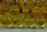 CAR523 15.5 inches 8mm - 9mm round natural amber beads wholesale