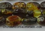 CAR546 15.5 inches 7*11mm - 8*12mm oval natural amber beads