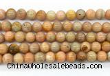 CCA553 15.5 inches 10mm round peach calcite gemstone beads