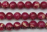 CDE2034 15.5 inches 6mm round dyed sea sediment jasper beads