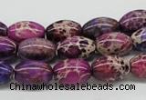 CDE31 15.5 inches 10*14mm rice dyed sea sediment jasper beads