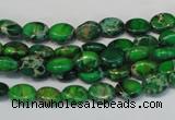 CDT178 15.5 inches 6*8mm oval dyed aqua terra jasper beads