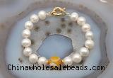 CFB1037 Hand-knotted 9mm - 10mm potato white freshwater pearl & yellow banded agate bracelet