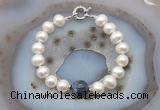 CFB1050 Hand-knotted 9mm - 10mm potato white freshwater pearl & sodalite bracelet