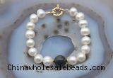 CFB1056 Hand-knotted 9mm - 10mm potato white freshwater pearl & golden obsidian bracelet
