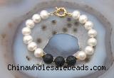 CFB1080 Hand-knotted 9mm - 10mm potato white freshwater pearl & black lava bracelet