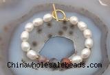 CFB963 Hand-knotted 9mm - 10mm rice white freshwater pearl & botswana agate bracelet