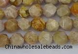 CFC236 15.5 inches 6mm faceted nuggets fossil coral beads