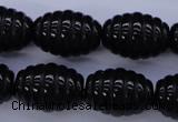 CFG759 15.5 inches 15*20mm carved rice black agate beads