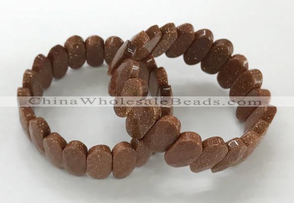 CGB3323 7.5 inches 10*20mm faceted oval goldstone bracelets