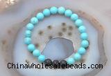 CGB6408 8mm round blue howlite & black lava beaded bracelets