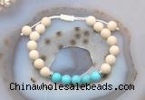 CGB6604 8mm round white fossil jasper & blue howlite adjustable bracelets