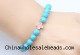 CGB9352 8mm, 10mm blue howlite & cross hematite power beads bracelets