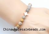 CGB9434 8mm, 10mm matte fossil coral & cross hematite power beads bracelets