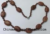 CGN201 22 inches 6mm round & 18*25mm oval goldstone necklaces