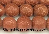 CGS490 15 inches 6mm faceted round goldstone beads