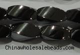 CHE161 15.5 inches 6*12mm twisted rice hematite beads