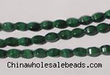 CMN222 15.5 inches 4*6mm faceted rice natural malachite beads