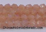 CMS1131 15.5 inches 6mm faceted nuggets peach moonstone beads