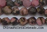 CNG6252 15.5 inches 6mm faceted nuggets rhodonite beads